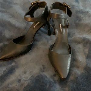 Beautiful Nine West pumps with ankle straps.